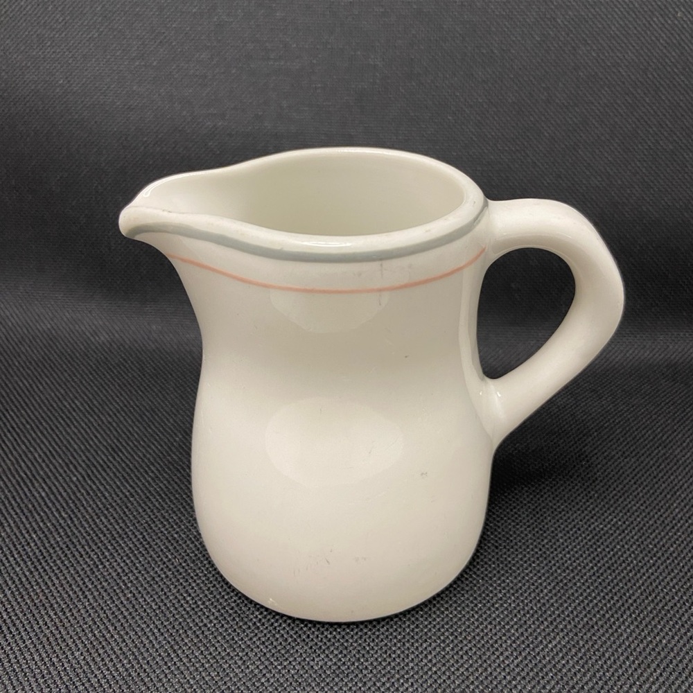 White Ceramic Coffee Creamer with Classic Design